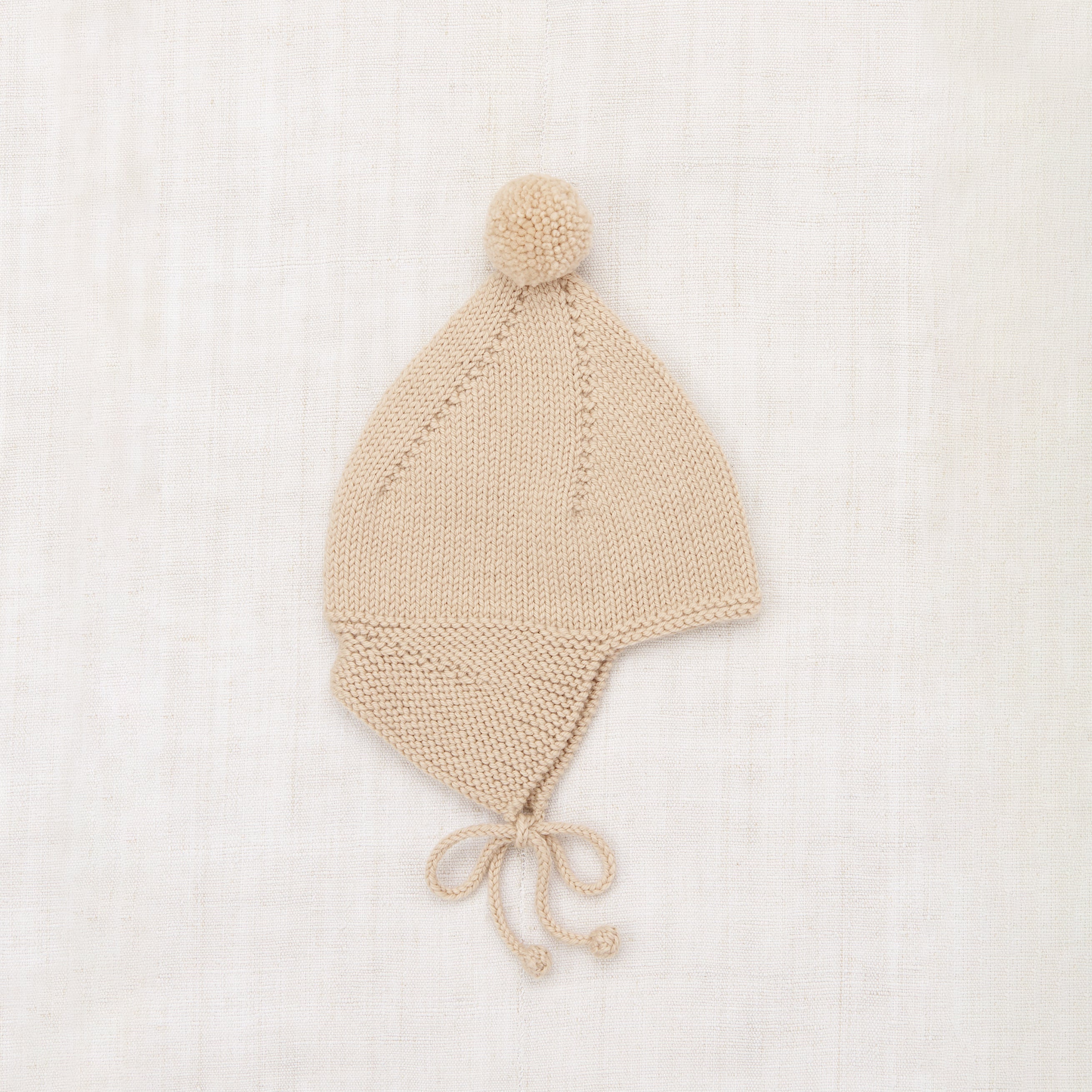 Baby Hand Knit Pointy Peak Hat in cream in sizes 0-24m. – MamaOwl