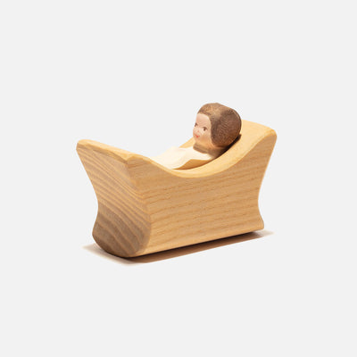 Handcrafted Wooden Child In Cradle