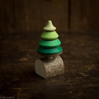 Wooden Tree Spinning Top On Branch