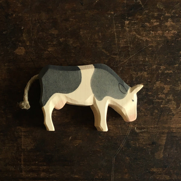Handcrafted Wooden Cow Eating